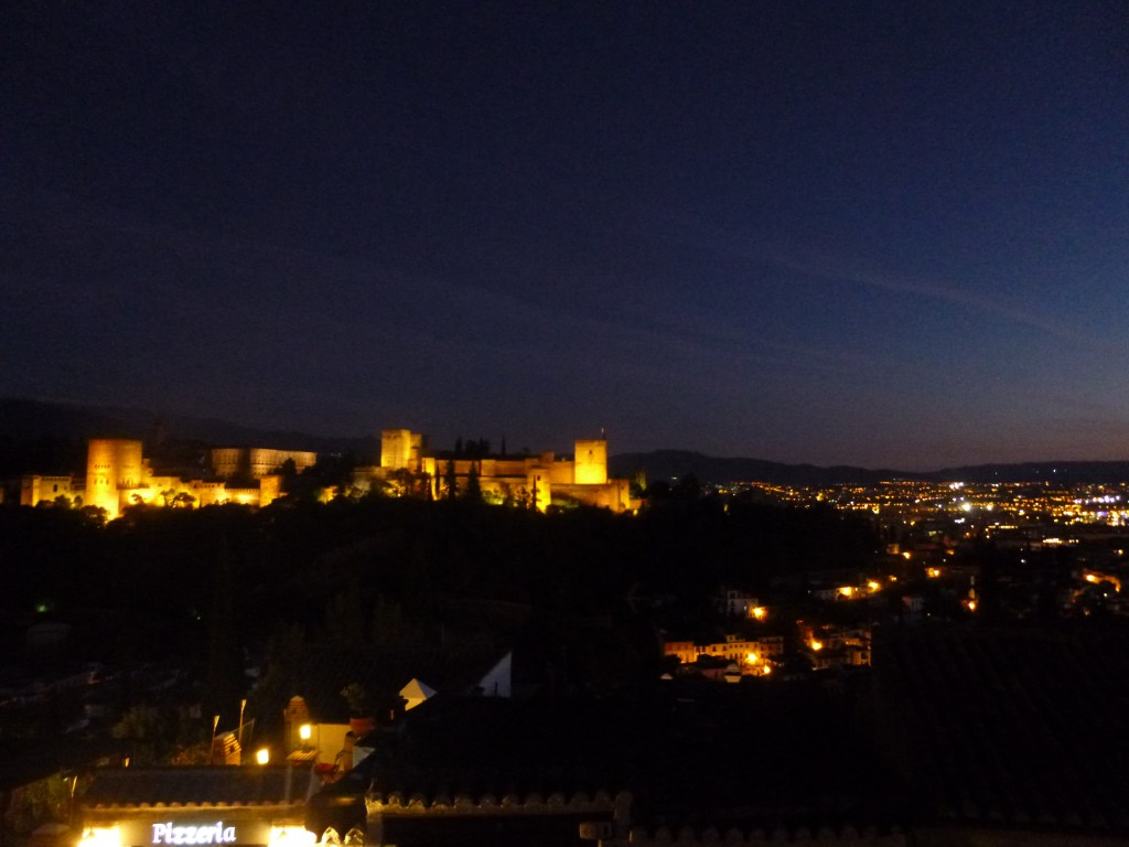 Granada at night, view of the Alhambra on the next hill